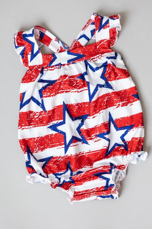 Vibrant Prints Stars & Stripes Ruffle Cross Back Romper