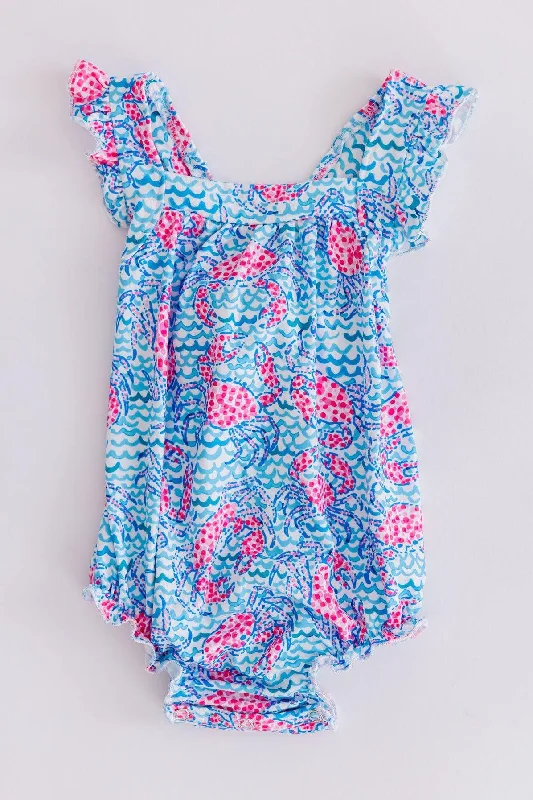 Bold Silhouette Crab Walk Ruffle Cross Back Romper