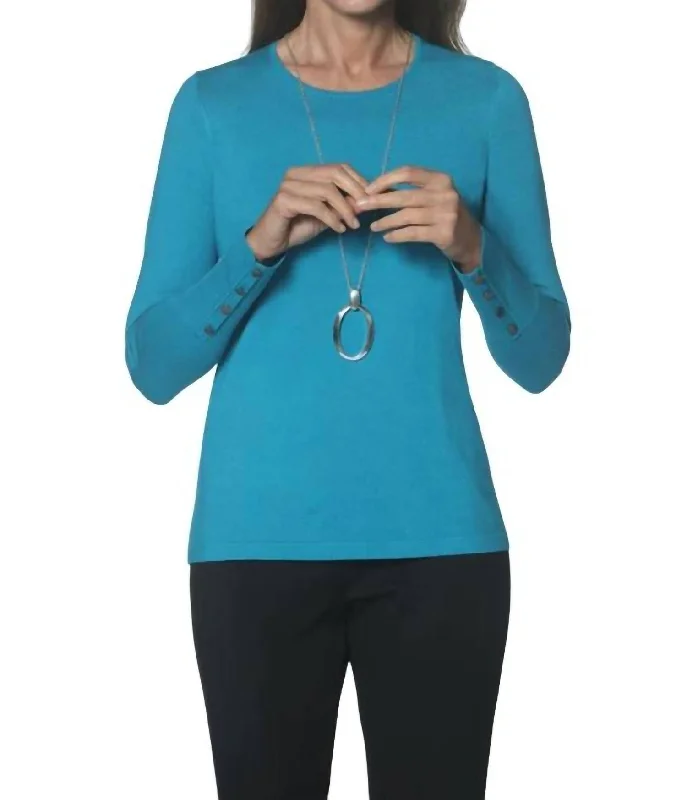 Versatile Wardrobe Essentials Crew Neck Sweater With Button Sleeve In Peacock